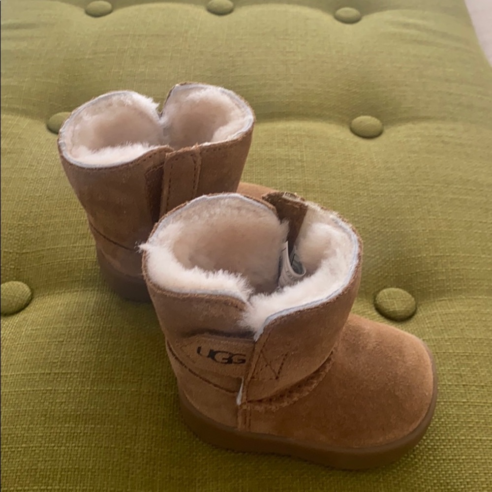 Never worn baby Ugg's. In perfect condition